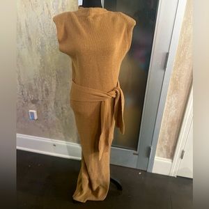 Long sweater dress with split and belted tie in a tan brown color